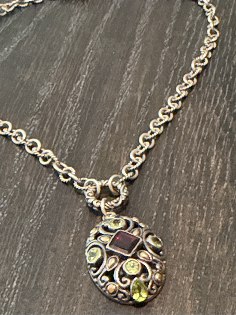 BJC Sterling Silver and 18k Pendant and Chain
Oval pendant with garnet & peridot